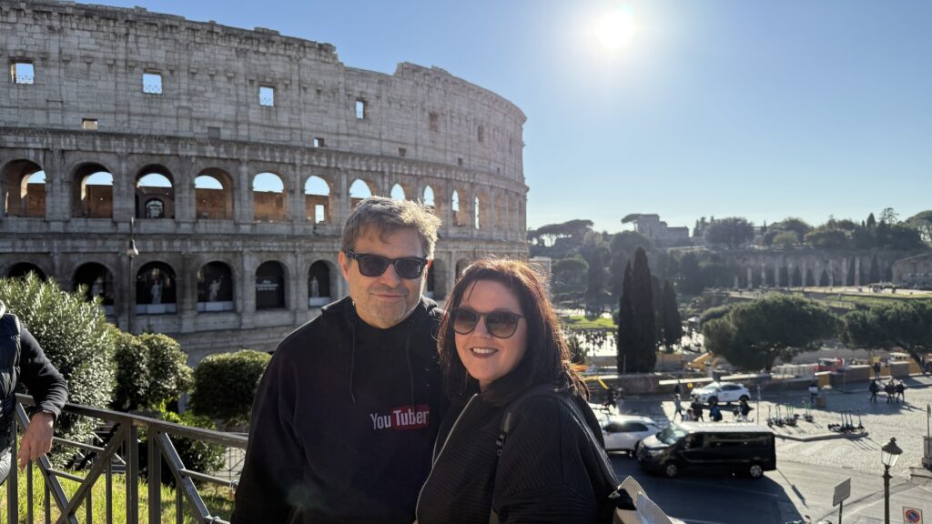 Photo in from of the colosseum in Rome